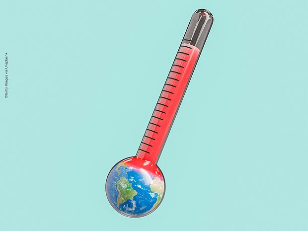  Erde mit Temperaturmessgerät symbolisch für die zunehmenden Temperaturen©Getty Images via Unsplash+