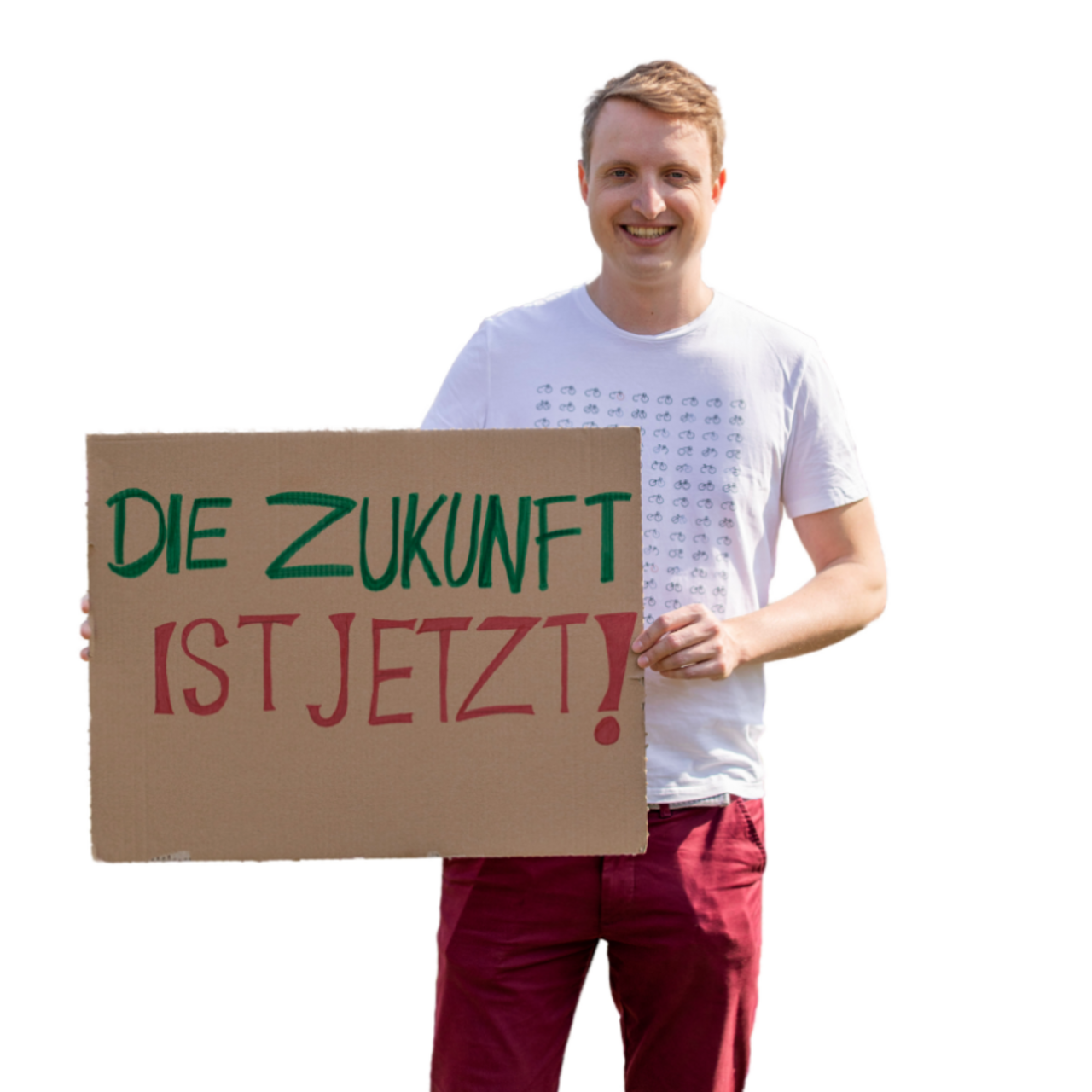 Junger Mann mit Demo-Schild "die Zukunft ist jetzt"